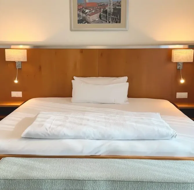 Unsere Zimmer 52 First Class Bett 01 1170x781 1