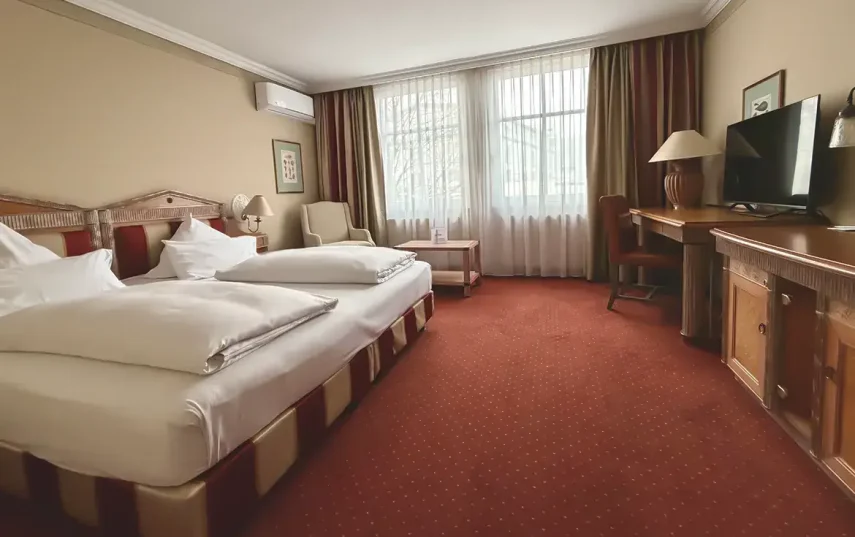 Komfort Zimmer Bett 02 1170x781 1