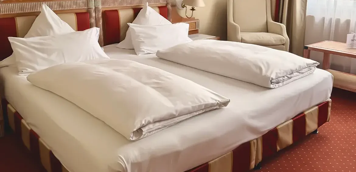 Komfort Zimmer Bett 1170x781 1